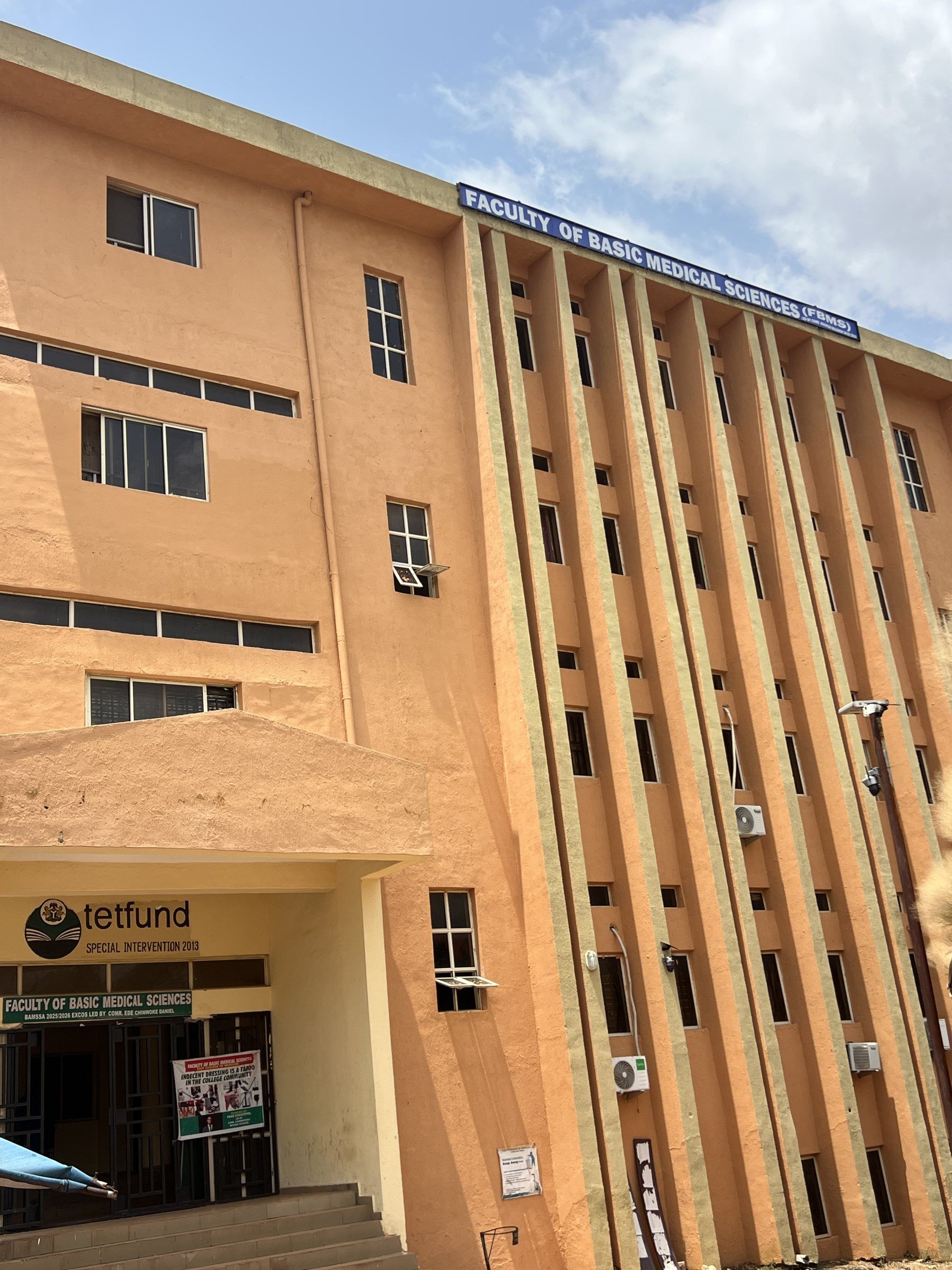 The Faculty of Basic Medical Sciences building, seen from its entrance steps.